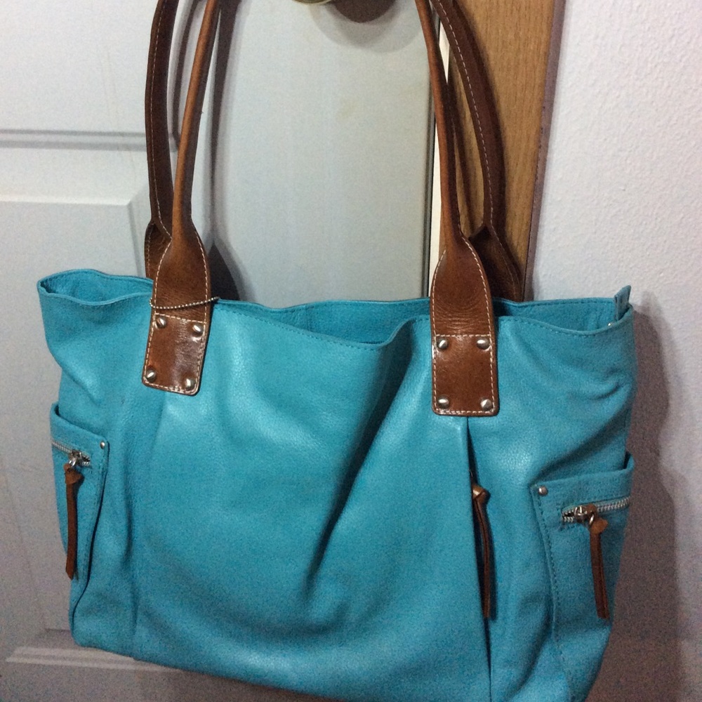 Turquoise purse, used leather